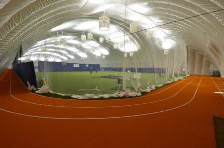 Running track separated by netting in the Dome